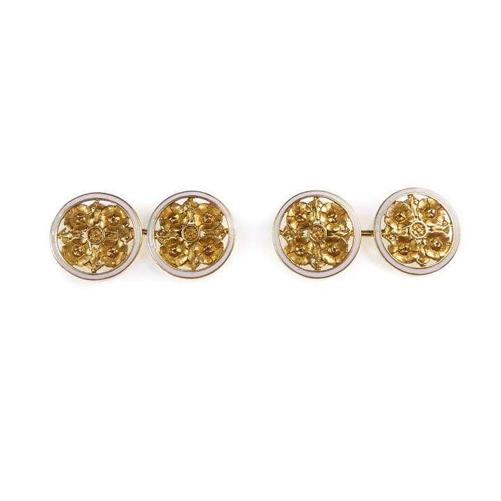 Pair of early 20th century round gold and white enamel cufflinks